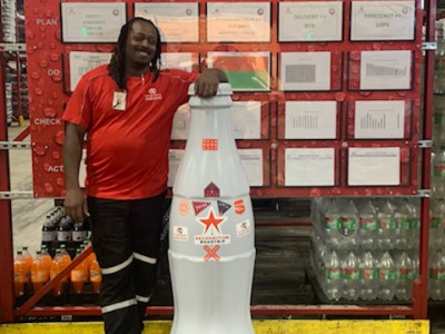 Willie Prince, Forklift Operator, with the Recognition Roadtrip Bottle at the Quapah facility on Oct. 25, 2021.