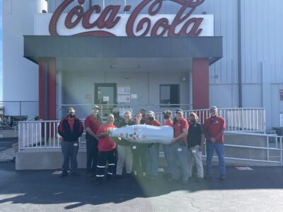 Abilene Distribution Center heroes say “goodbye” to the bottle as it sets out for the next stop of the Recognition Roadtrip.
