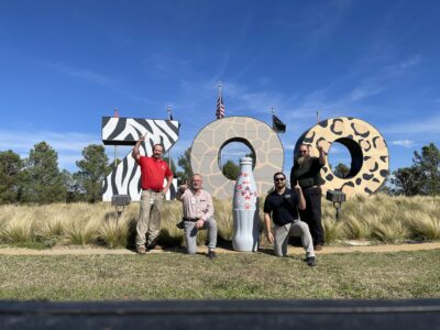 Abilene heroes with the Recognition Roadtrip Bottle at the Abilene Zoological Park on Nov. 8, 2021. The Abilene Zoo was founded in 1966 and has more than 1,000 animals and over 250 different species.
