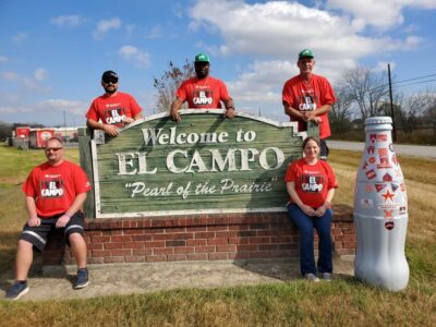 El Campo heroes welcome the Recognition Roadtrip Bottle to their great town on Jan. 6, 2022. Throughout history, El Campo has been named the “Prairie Switch” and “Pearl of the Prairie” until the name was switched by locals to “El Campo.” Once a railroad camp, El Campo was incorporated in 1905.