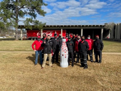 Beaumont heroes with the Recognition Roadtrip bottle on Jan. 19, 2022.
