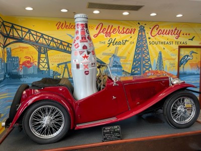 The Recognition Roadtrip Bottle goes for a drive in a vintage 1949 TC MG, a gift from the Rogers family to the Visitor’s Center. The 1949 TC MG was a British car, which many U.S. servicemembers bought in Europe and transferred back to the U.S. after World War II.