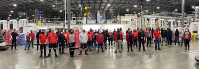 Northpoint heroes with the Recognition Roadtrip Bottle and the vertique sorter, which helps pack the iconic Coca-Cola brands for distribution, on Jan. 11, 2022. No visit to Houston is complete without seeing the Northpoint facility, the first bottling facility built in the U.S. in nearly a decade! Northpoint opened in 2020, and it is 100% powered by renewable energy!