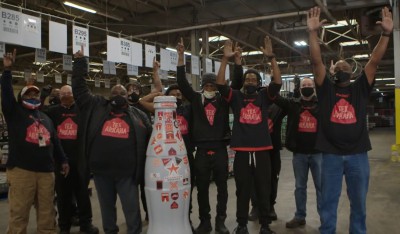 Texarkana heroes welcome the Recognition Roadtrip Bottle to their facility on Feb. 7, 2022.